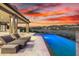 Inviting pool area with comfortable lounge chairs and panoramic views at 9127 N Fireridge Trl, Fountain Hills, AZ 85268