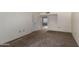 Neutral bedroom featuring carpet and an entry to another room at 15462 N Lakeforest Dr, Sun City, AZ 85351