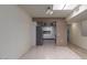 Tile dining room with view into kitchen at 15462 N Lakeforest Dr, Sun City, AZ 85351