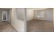 Neutral carpet and entry to other parts of the home at 15462 N Lakeforest Dr, Sun City, AZ 85351
