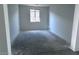 This bedroom features tile flooring and a large window with lots of natural light at 32155 N Lone Rancher Way, San Tan Valley, AZ 85140