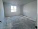 This bedroom features tile flooring and a large window with lots of natural light at 32155 N Lone Rancher Way, San Tan Valley, AZ 85140
