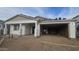 New home exterior featuring a two-car garage and covered entrance, undergoing construction at 32155 N Lone Rancher Way, San Tan Valley, AZ 85140