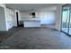 This spacious kitchen with stainless steel appliances and bar top is perfect for entertaining at 32155 N Lone Rancher Way, San Tan Valley, AZ 85140