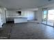 This spacious kitchen with stainless steel appliances and bar top is perfect for entertaining at 32155 N Lone Rancher Way, San Tan Valley, AZ 85140