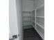 Walk-in pantry featuring ample shelving perfect for organization and storage at 32155 N Lone Rancher Way, San Tan Valley, AZ 85140