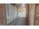 Unfinished room features insulation, framing, and rough electrical at 32155 N Lone Rancher Way, San Tan Valley, AZ 85140