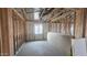A framed room in a new house, featuring insulation, window and pre-plumbing at 32155 N Lone Rancher Way, San Tan Valley, AZ 85140