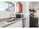 Well-equipped kitchen with granite countertops, stainless steel sink, and modern appliances at 4333 N 15Th Dr, Phoenix, AZ 85015