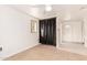 Living room featuring light tile floors, neutral paint, and an open floor plan at 4333 N 15Th Dr, Phoenix, AZ 85015