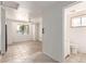 Living room featuring light tile floors and a pass-through to the adjacent bathroom at 4333 N 15Th Dr, Phoenix, AZ 85015