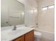 Bathroom with vanity and shower/tub combo at 1384 E Press Rd, San Tan Valley, AZ 85140