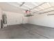 Spacious two-car garage with ample storage and utility connections for appliances, shelving, and more at 1384 E Press Rd, San Tan Valley, AZ 85140