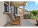 Relaxing back patio with comfortable seating and views of the backyard at 18001 W Cassia Way, Goodyear, AZ 85338
