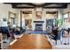 Expansive common area features fireplace, comfortable seating, and stylish decor for relaxed gatherings at 18001 W Cassia Way, Goodyear, AZ 85338