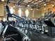 Well-equipped fitness center with state-of-the-art equipment, natural light, and ample space for a comprehensive workout routine at 18001 W Cassia Way, Goodyear, AZ 85338