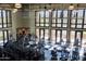 Bright, airy gym with cardio machines, free weights, and expansive windows, promotes a healthy and active lifestyle at 18001 W Cassia Way, Goodyear, AZ 85338