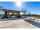 Outdoor ping pong table and shaded seating area, perfect for community gatherings at 23145 E Via Las Brisas --, Queen Creek, AZ 85142