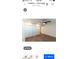 A bright primary bedroom featuring hardwood floors, ceiling fan, and spacious closets providing ample storage at 5103 S Birch St, Tempe, AZ 85282