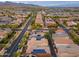 Panoramic aerial perspective of a suburban community featuring well-maintained homes and solar panels at 2305 N Heritage St, Buckeye, AZ 85396