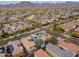 High-angle aerial shot of a friendly neighborhood with lovely streetscapes and lush trees at 2305 N Heritage St, Buckeye, AZ 85396