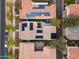 An overhead view of houses that shows their rooftops, solar panels, and some outdoor furniture at 2305 N Heritage St, Buckeye, AZ 85396