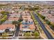 Lush community aerial view showcasing beautiful homes with well maintained streetscapes and sidewalks at 2305 N Heritage St, Buckeye, AZ 85396