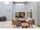 View of a beautiful patio with pavers, an outdoor seating area, and access to the home at 2305 N Heritage St, Buckeye, AZ 85396