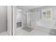 Bright bathroom with a glass shower and separate soaking tub, perfect for relaxation and comfort at 2305 N Heritage St, Buckeye, AZ 85396