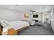 Spacious bedroom features a sitting area, ceiling fan, and neutral color palette, creating a cozy retreat at 2305 N Heritage St, Buckeye, AZ 85396