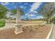 Walton Park neighborhood featuring green spaces, playground, and walking paths at 2305 N Heritage St, Buckeye, AZ 85396