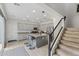 Open kitchen featuring a large island, granite countertops, and stainless steel appliances at 2305 N Heritage St, Buckeye, AZ 85396