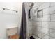 Bathroom featuring a tiled shower with a rainfall showerhead, and neutral finishes at 2315 W Union Hills Dr # 120, Phoenix, AZ 85027