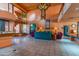 Spacious lobby area with tiled flooring, comfortable seating, elegant lighting, and access to stairs and elevators at 4303 E Cactus Rd # 407, Phoenix, AZ 85032