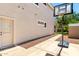 The house exterior has a basketball net, backyard door, and a storage shed at 5752 S Crossbow Pl, Chandler, AZ 85249