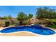 Beautiful backyard pool and spa create a private retreat for outdoor relaxation at 5752 S Crossbow Pl, Chandler, AZ 85249