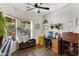 Home office features built-in desk, ample storage, and lots of natural light at 88 W Reeves Ave, San Tan Valley, AZ 85140