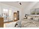 Bright bedroom with vaulted ceiling and glass doors to balcony at 8845 S 48Th St # 1, Phoenix, AZ 85044