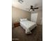 Bedroom with brown carpet, ceiling fan, and closet at 23236 W Yavapai St, Buckeye, AZ 85326