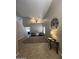 Spacious entryway with high ceilings, tiled floors, and tasteful decor, creates a welcoming ambiance at 23236 W Yavapai St, Buckeye, AZ 85326