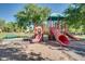 Community playground with multiple slides and climbing structures, perfect for active outdoor play at 4287 E Tyson St, Gilbert, AZ 85295