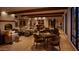 Inviting community clubhouse with comfortable seating, fireplace, and game tables at 4849 N Camelback Ridge Rd # A309, Scottsdale, AZ 85251