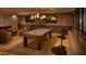 Community game room featuring a pool table, TV, and seating area at 4849 N Camelback Ridge Rd # A309, Scottsdale, AZ 85251