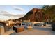 Scenic rooftop patio showcasing lounge seating, a fire pit, and a beautiful mountain backdrop at 4849 N Camelback Ridge Rd # A309, Scottsdale, AZ 85251