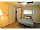 Carpeted bedroom with a new ceiling fan and closet at 120 N Val Vista Dr # 230, Mesa, AZ 85213