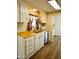 Kitchen with stainless steel dishwasher and wooden countertops at 120 N Val Vista Dr # 230, Mesa, AZ 85213