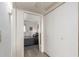 View from the hallway through a bedroom and closet leads to a balcony at 12123 W Bell Rd # 339, Surprise, AZ 85378