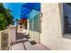 Balcony entrance with metal security door, sunshade and modern building finishes at 12123 W Bell Rd # 339, Surprise, AZ 85378