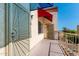 Front entrance with security gate, awning, and unit number at 12123 W Bell Rd # 339, Surprise, AZ 85378