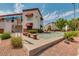 Community shuffleboard court with seating surrounded by desert landscaping at 12123 W Bell Rd # 339, Surprise, AZ 85378
